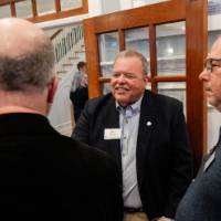 Guests chat during the award event